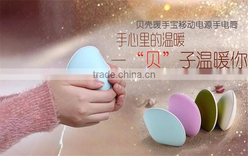 Shell charge hand warmer Portable mini hand warmer Electric heating treasure with mobile power supply and electric torch