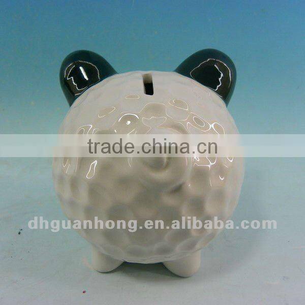 Ceramic money bank in sheep shape