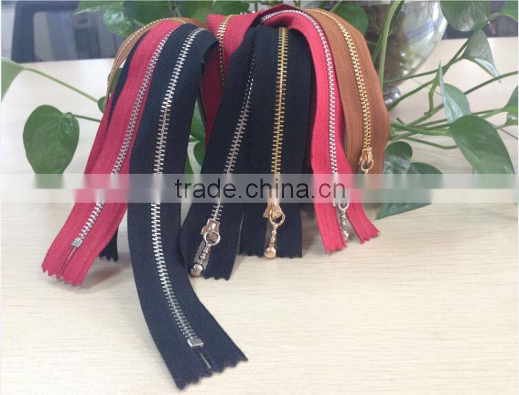 2015 XLY No.2 golden and silver teeth auto lock close end metal zipper