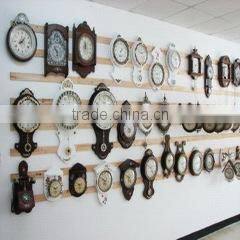 pendulum wall clock day month year clock backwards running clock