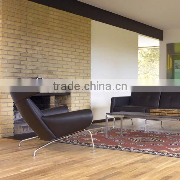 OX-chair and ottoman by Hans Wegner