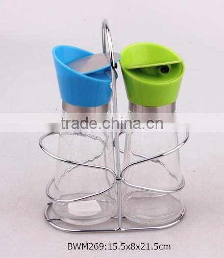 glass jar set for oil with metal stand
