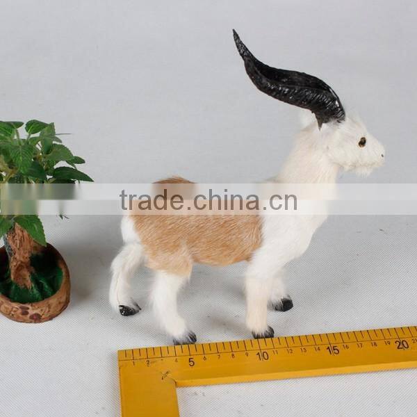 Ornamental plastic animal horn products on sheep