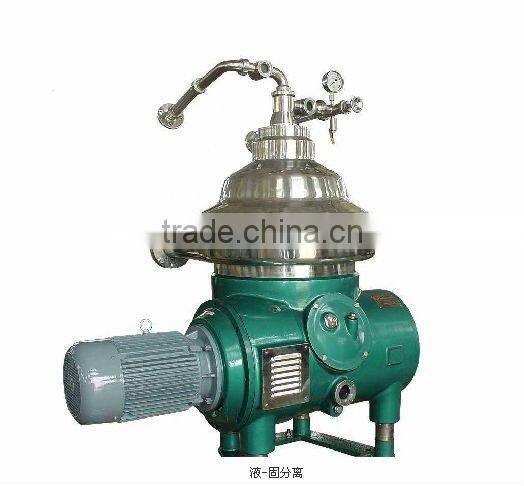 Automatic discharge centrifugal separation of milk