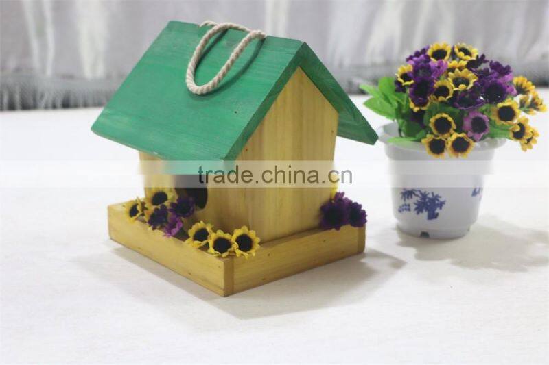 Finished colorful handmade wooden bird nest