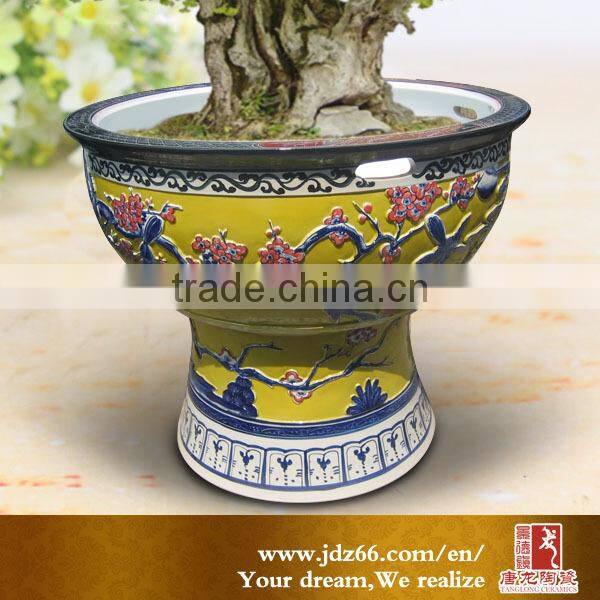 Yellow glazed engraved large ceramic pot for decoration