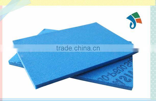 Abrasive foam sanding pad