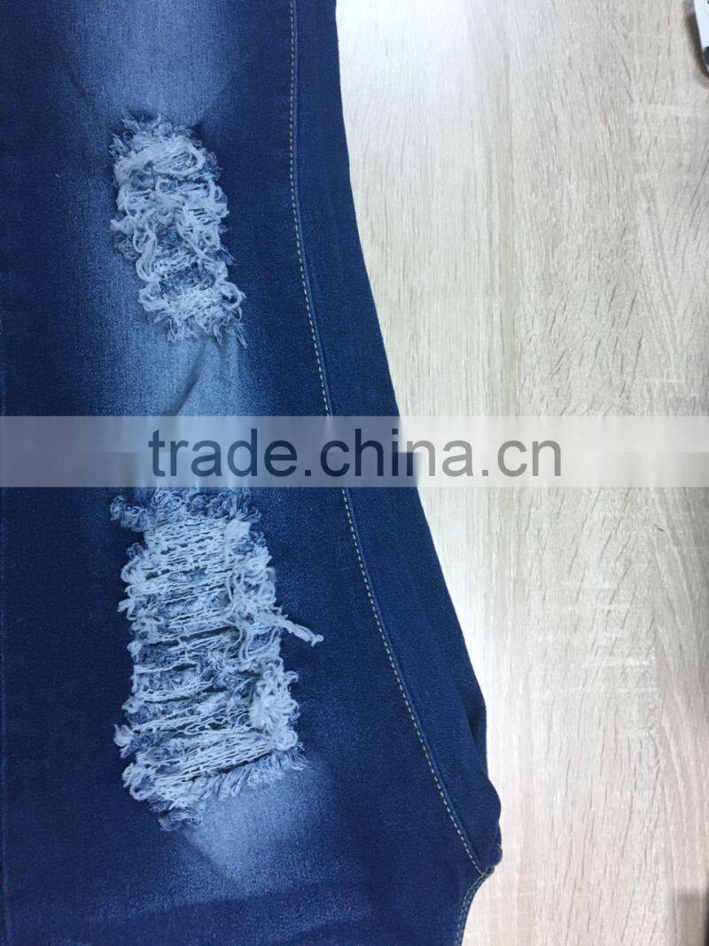 GZY slim and ripped hole women jeans leather label stock high quality wholesale china 2017