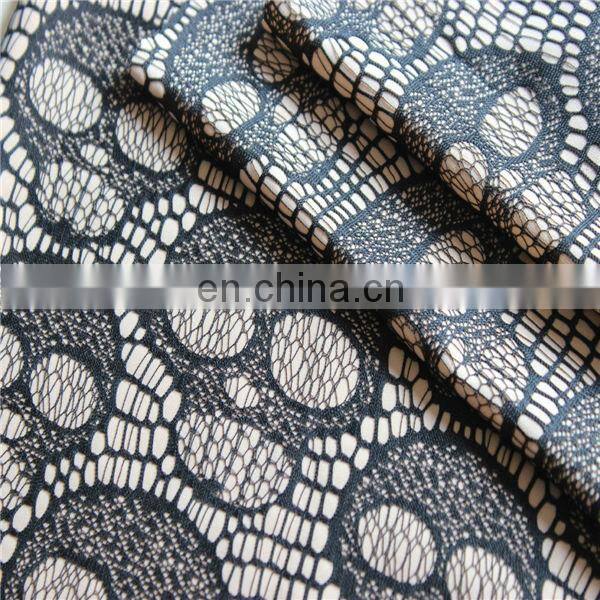 Knit polyester spandex with skull pattern lace coated