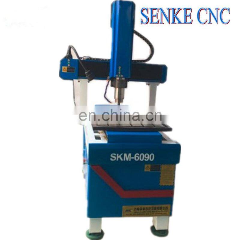 SKM-6090 Whole cast iron body metal coin engraving machine