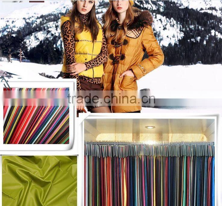 Factory wholesales 2014 textile newly design polyester fabric taffeta bright for garment, lining, suit, jacket and proof coat