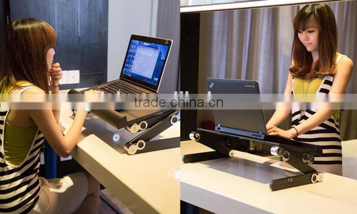 Folding laptop table for computer with cooling fans and mouse Tray and Book Clamping