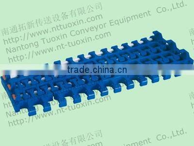 2400C Radius Flush Grid with Hold-down Edge Modular Belt