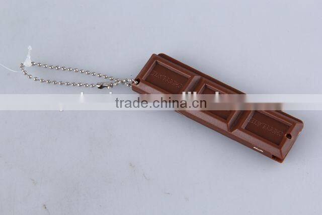 Chocolate shaped hair brush with hanging chain/folding comb