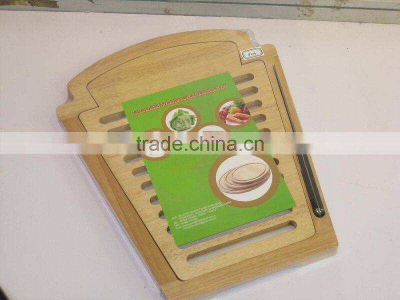 wooden bread board with knife