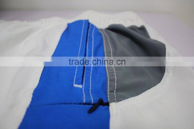 2016 WHOLESALE OEM SUBLIMATED BEACH WEAR SWIMMING TRUNKS WITH TRANGLE MESH LINER