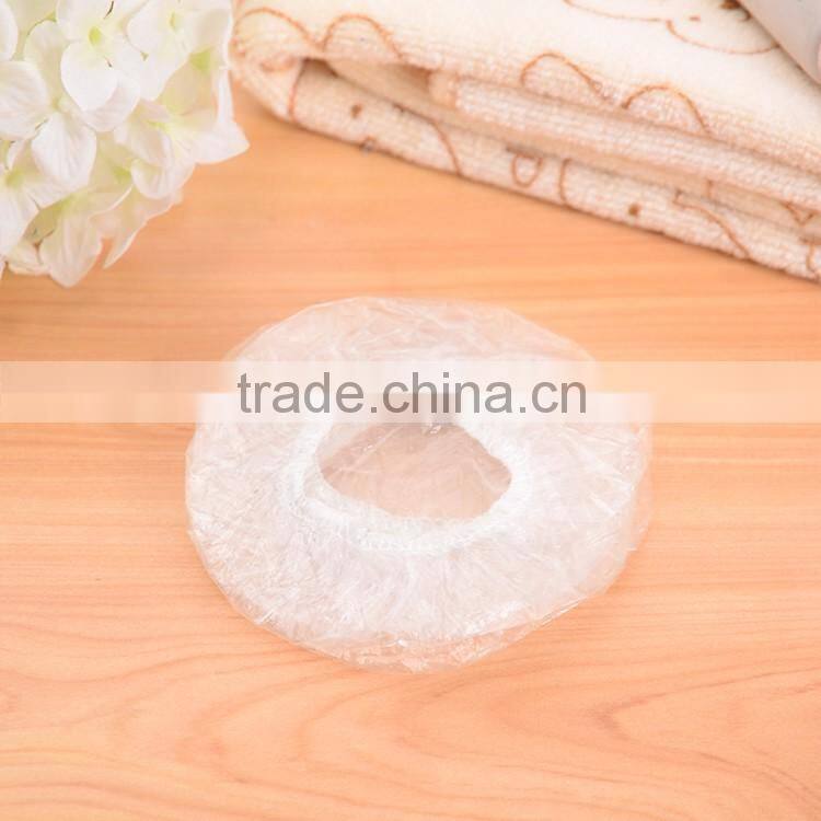 Disposabel plastic ear cover for hair salon made by hand