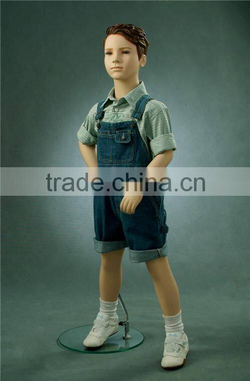 Christmas window display dress up realistic children mannequins
