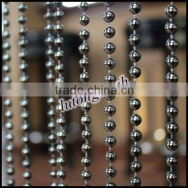 Decorative metal beaded curtains for bar or restaurant as a space divider