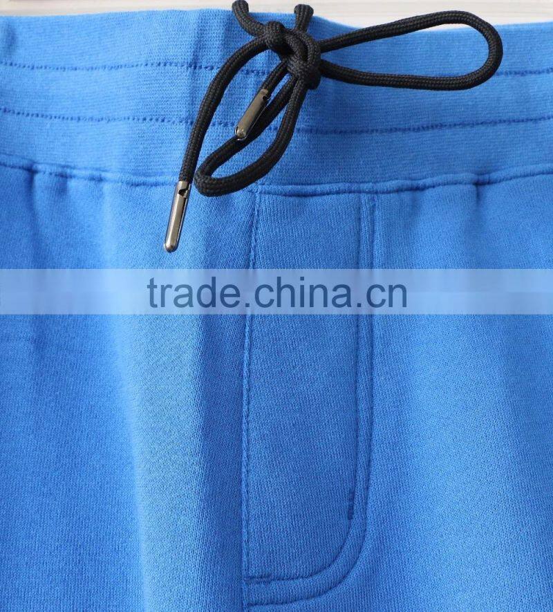 100% cotton men jogging pants with side waterproof pockets and logo print