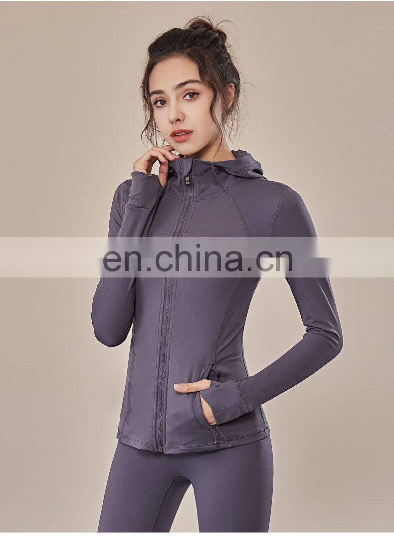 European and American fall/winter hooded sportswear women women's long-sleeved zipper tight-fitting yoga wear
