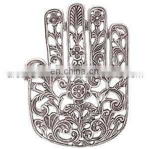 silver flower design trivet