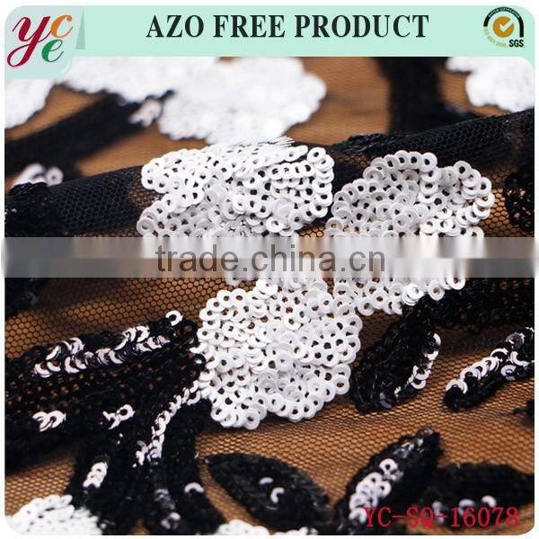 Black and white small flowers in organza and sequin lace fabric embroidery for garment