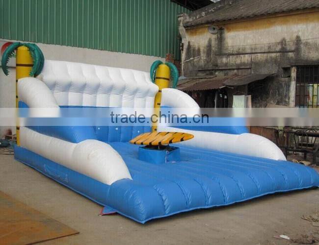 Inflatable surf board/inflatable surf simulator
