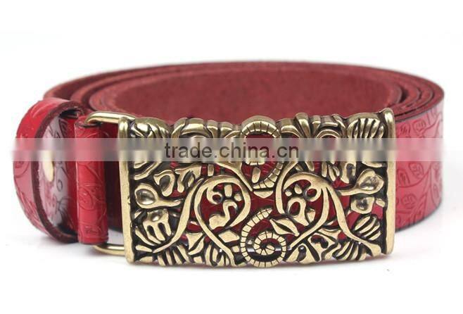 man carving genuine leather belt