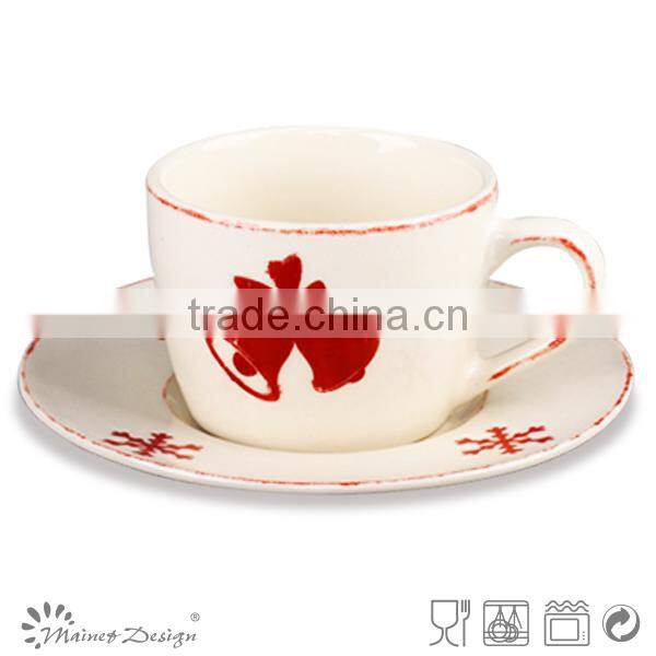high-volume Christmas coffee cup and saucer