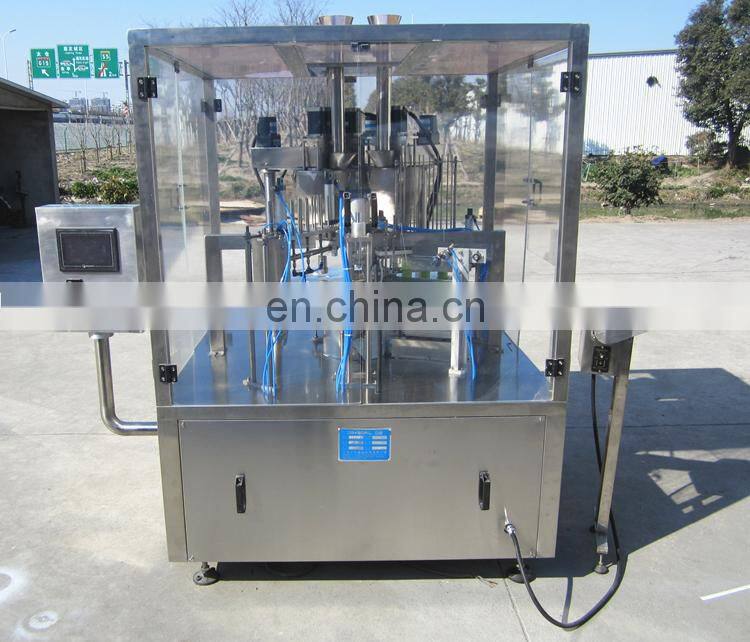 Rotary plastic cup filler and sealer machine