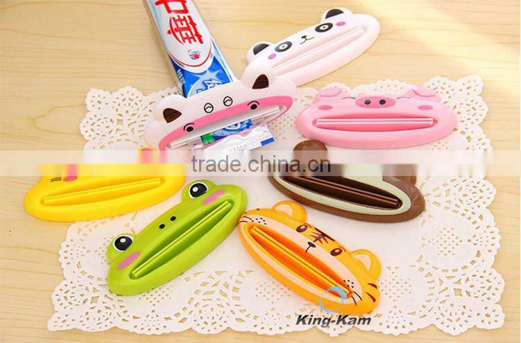 hot selling plastic toothpaste tube squeezer/toothpaste dispenser,wholesale custom children automatic toothpaste dispenser