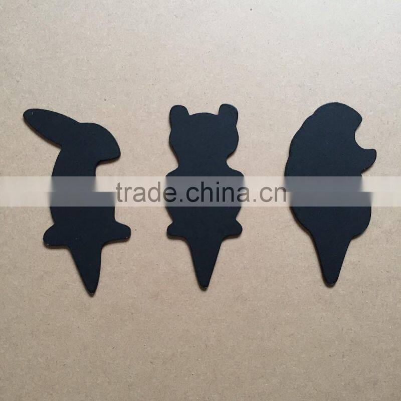 Wooden animal shapes of plant labels