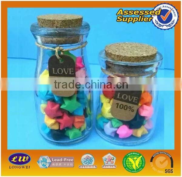 Small cute glass bottle with wooden lid