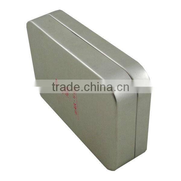 silvery rectangular tea can