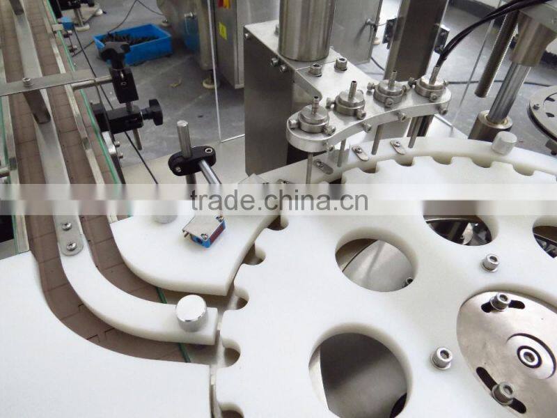 DTNX-60Y Mechanical Hand Duel Lines Eye Drop Filling, Plugging And Capping Machine