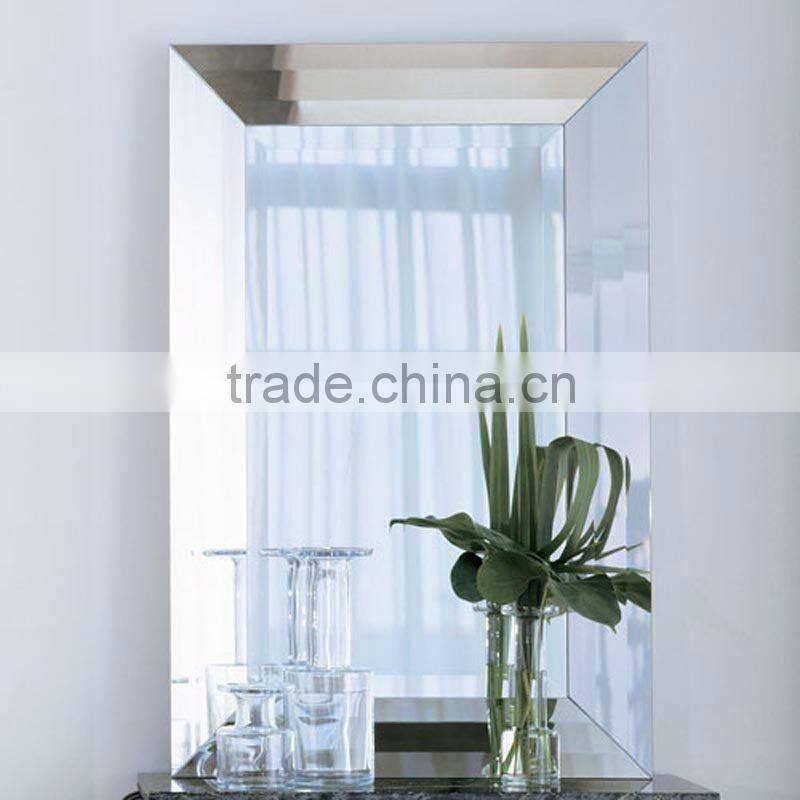 Frameless bevelled edge mirror
