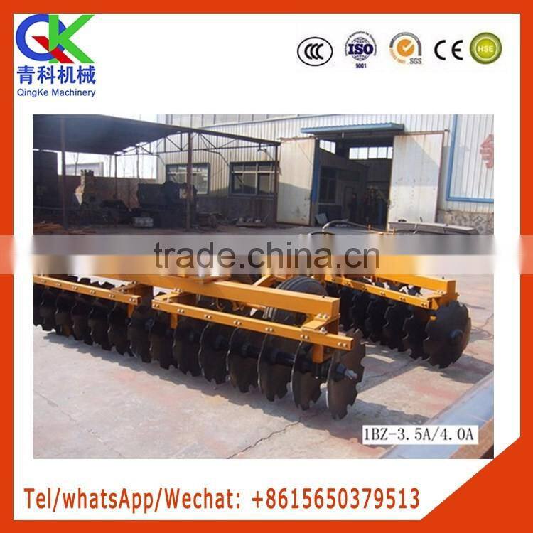 Hydraulic traction heavy harrow with hydraulic lifting tyres