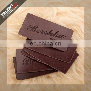 custom embossed private brand name logo jeans leather patch