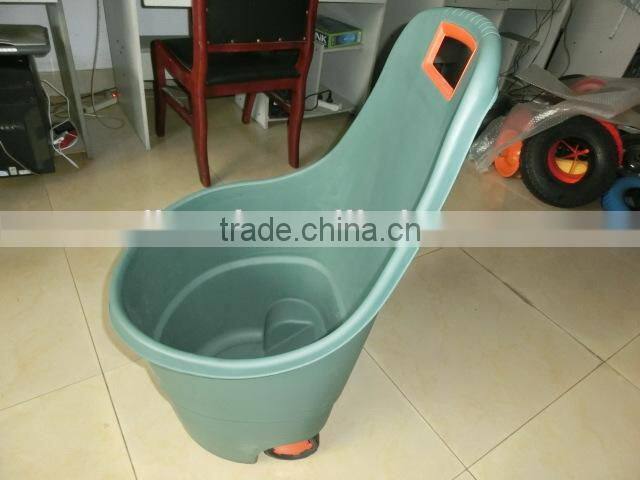 plastic trolley bin in garden , garden tool trolley
