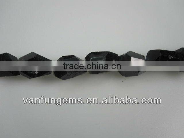 Black tourmaline faceted tumble stone