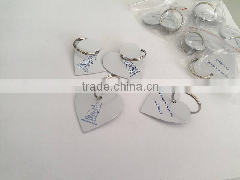 antique black promotional key tag with company logo