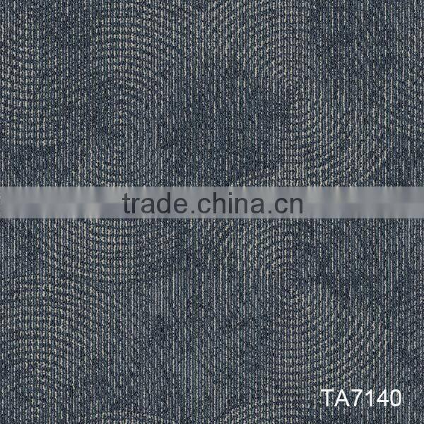 Durable level loop carpet tiles with PVC backing