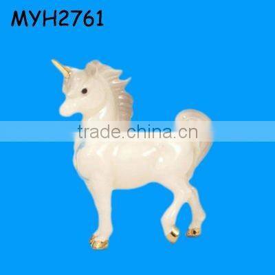 white ceramic horse sculpture