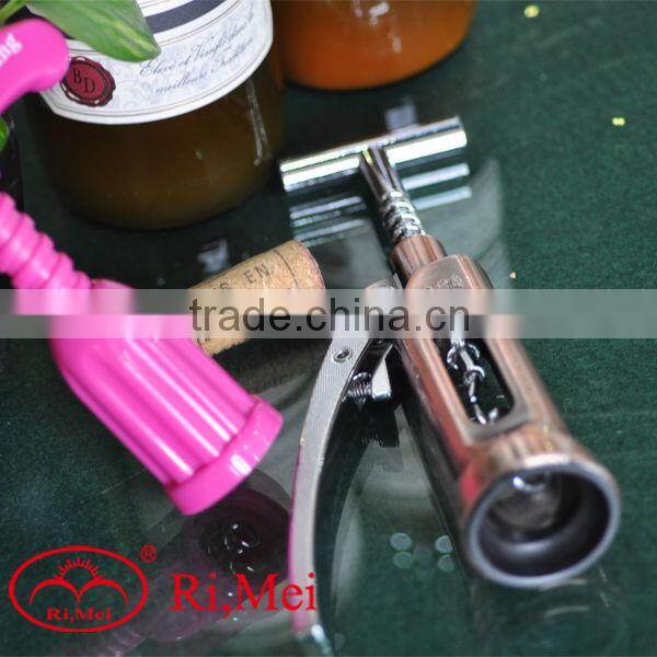 cast iron and plastic push down bottle opener