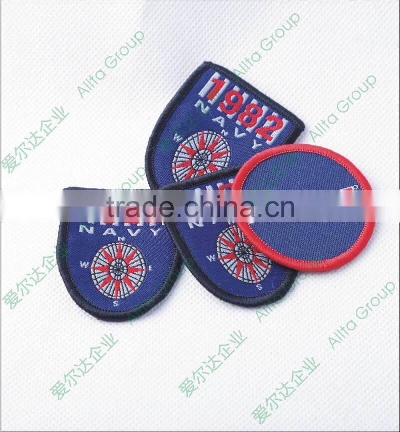 Wholesale cheap custom fashion decorative machine woven / embroidery badge shield or other