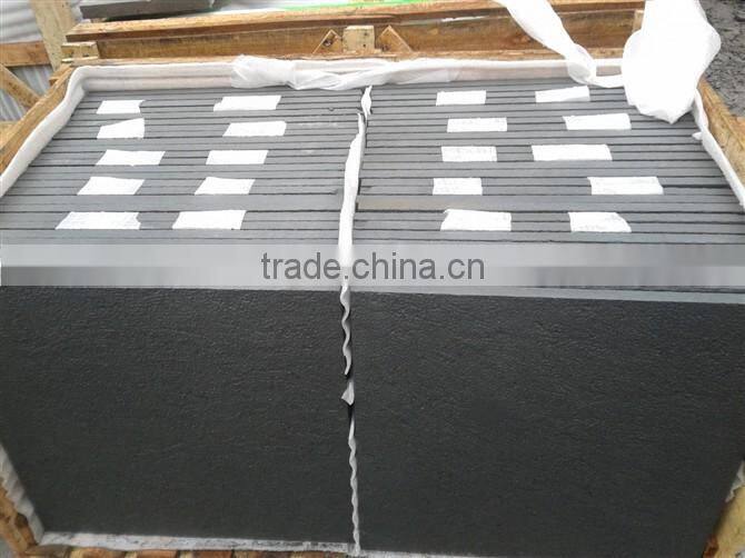 bush hammered black sandstone tile