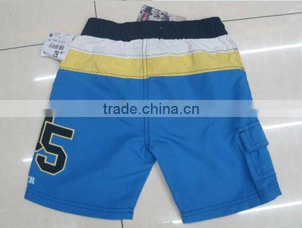 cheap kids 100%polyester stock lot beach shorts