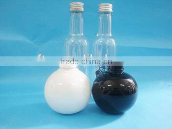 empty plastic PET juice bottle with aluminum cap