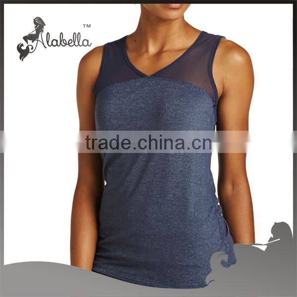 Ladies racer back mesh tank tops wholesale The smooth mosture wicking fabric keeps you refreshingly cool for moving and working